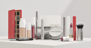 Product Shot of Full line of Mirabella Beauty makeup products displayed on a white shelf: Gluten Free & Talc Free Mineral cosmetics