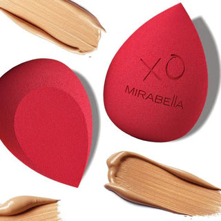 Image of Mirabella Beauty's Latex Free Red, Pro Beauty Makeup Blender with foundation swatches on white background