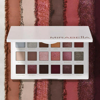 True To You Buff Eyeshadow Palette opened on top of the shadow swatches showcasing the palettes array of matte & shimmer shades.