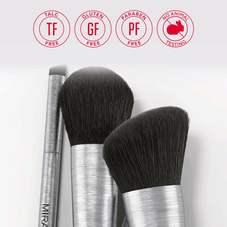 Close-up of 3 Mirabella professional makeup brushes with synthetic bristles & brushed aluminum handles & the brand's core value emblems floating.