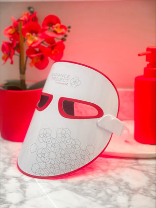 Mirabella 7-Color LED Mask lifestyle image: Features red light & see-through goggles, allowing movement & daily tasks while being wireless.