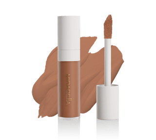 Mirabella Beauty Perfecting Liquid Concealer tube with doe-foot applicator and swatch in DeepD200, showcasing sleek design and precise application.