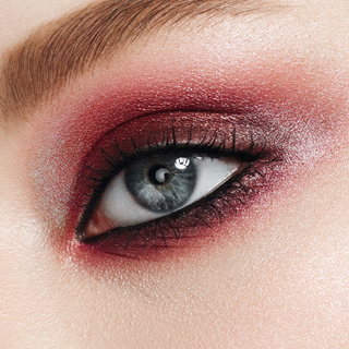 Closeup of Mirabella model wearing the rich pink-hued eyeshadows in the True To you Buff Eyeshadow palette for a bold eye makeup look.