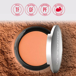 Open Mirabella Pure Press Powder on top of finely milled powder, showcasing its natural texture and smooth finish, highlighting core values of brand.